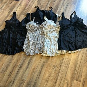 Meet Curve Bathing Suits 4 one piece swim dress and one black top.